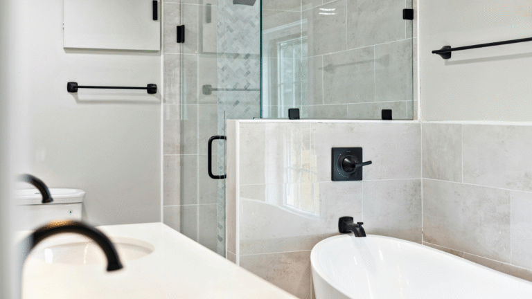 Frameless glass shower installation during a Dallas bathroom remodel