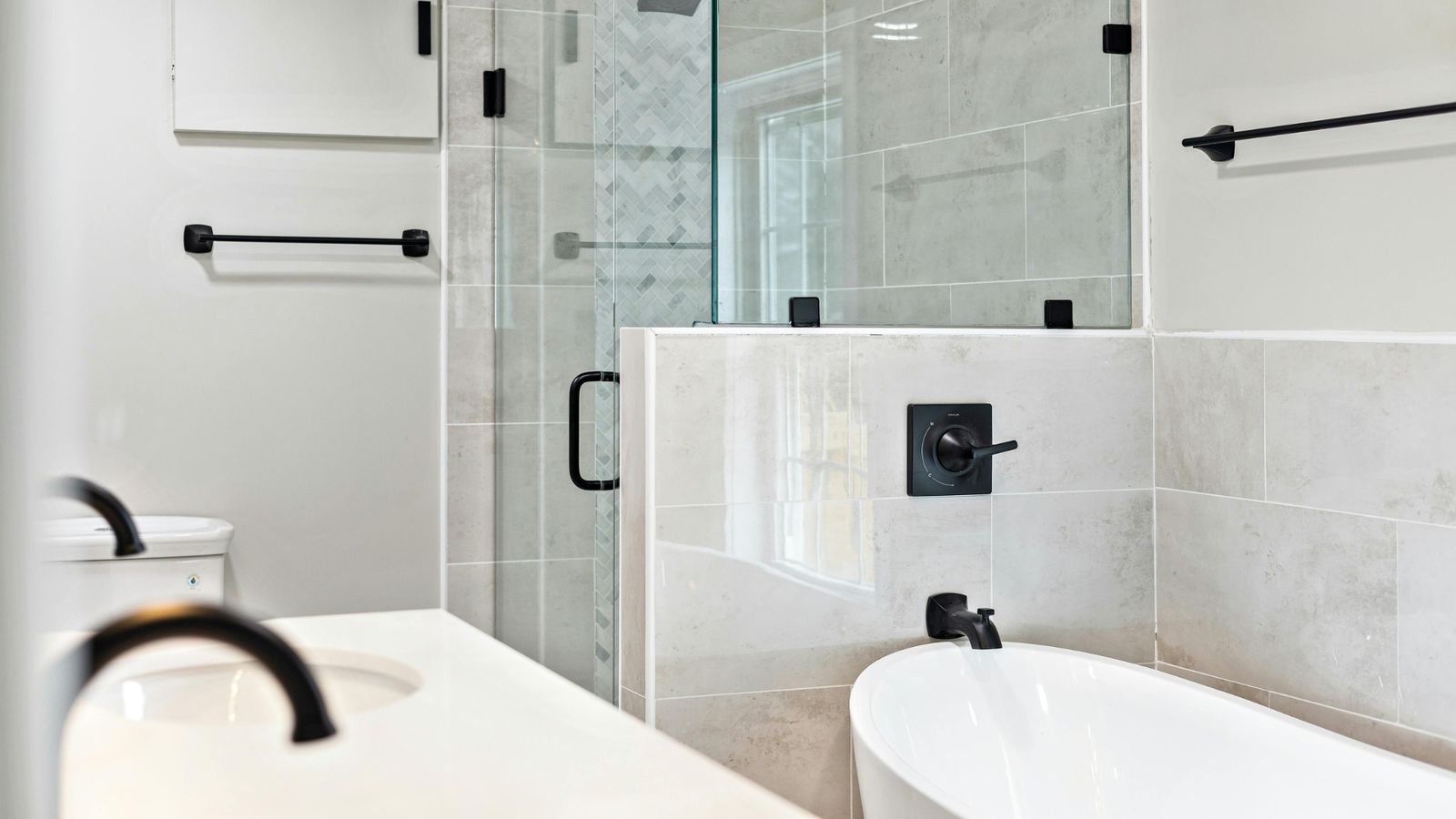 Frameless glass shower installation during a Dallas bathroom remodel